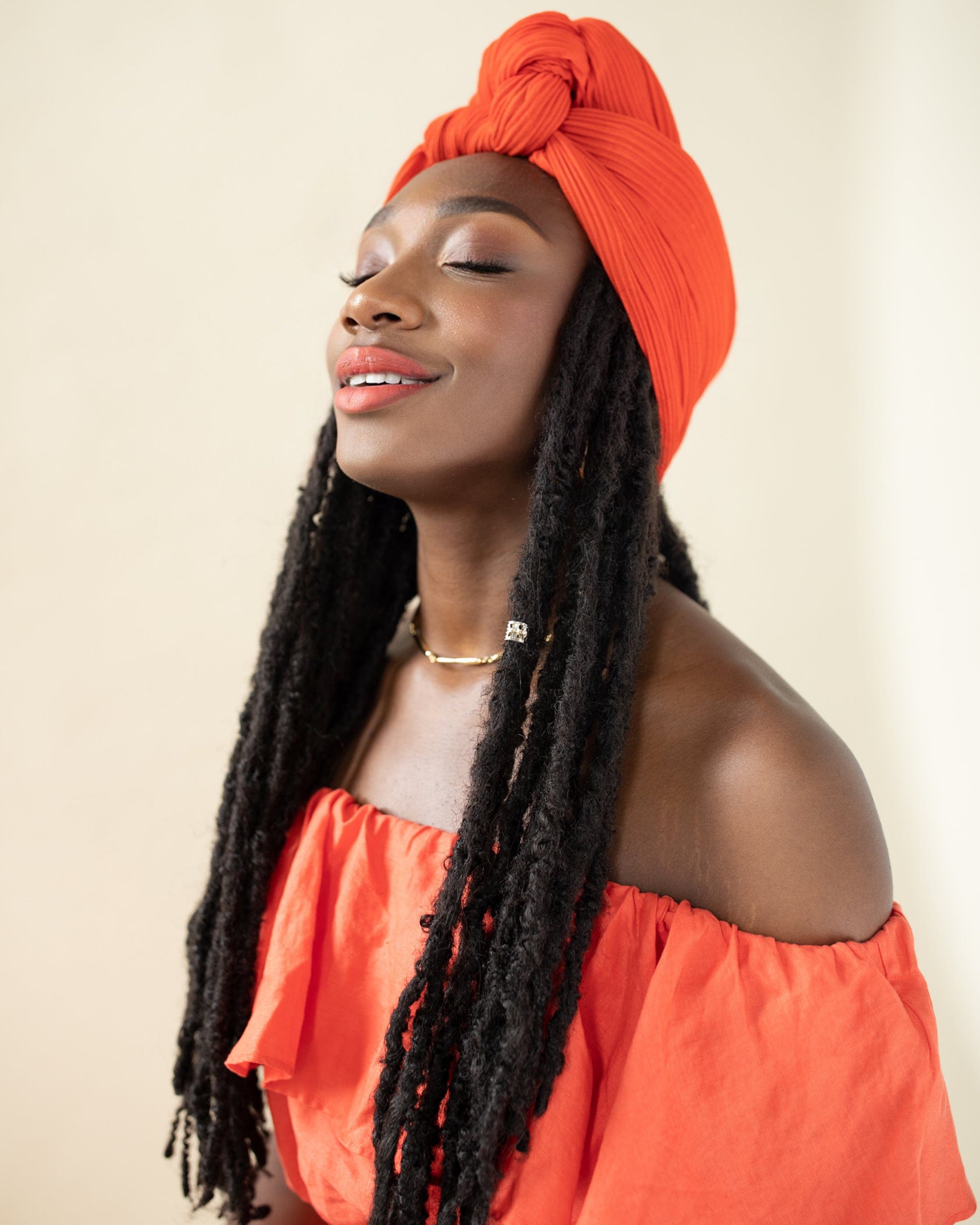 The Wrap Life Pleated Head Wrap in Sundance Orange Head Wrap