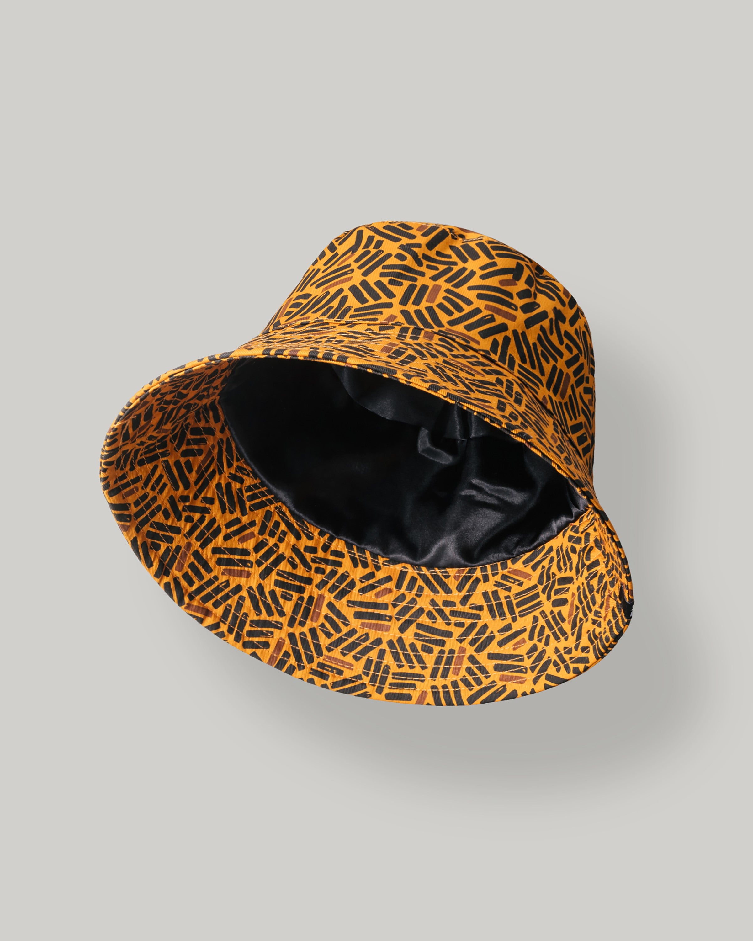 A Brief History of the Bucket Hat – The Wrap Life