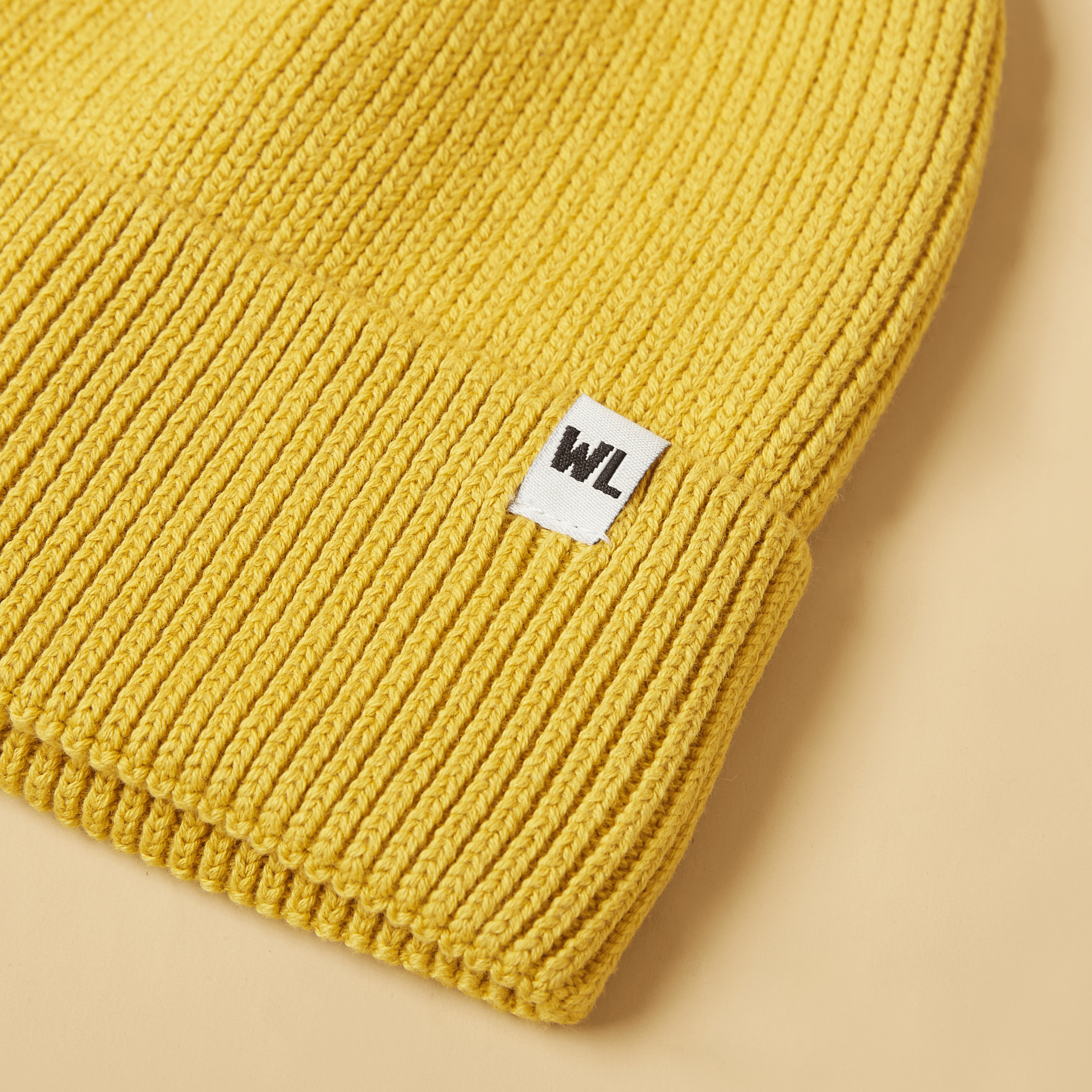 the-wrap-life-cuffed-satin-lined-beanie-in-citrine-hat-yellow-30560331595889_40f7821b-f0f7-4624-85c8-493df09aab7b.png