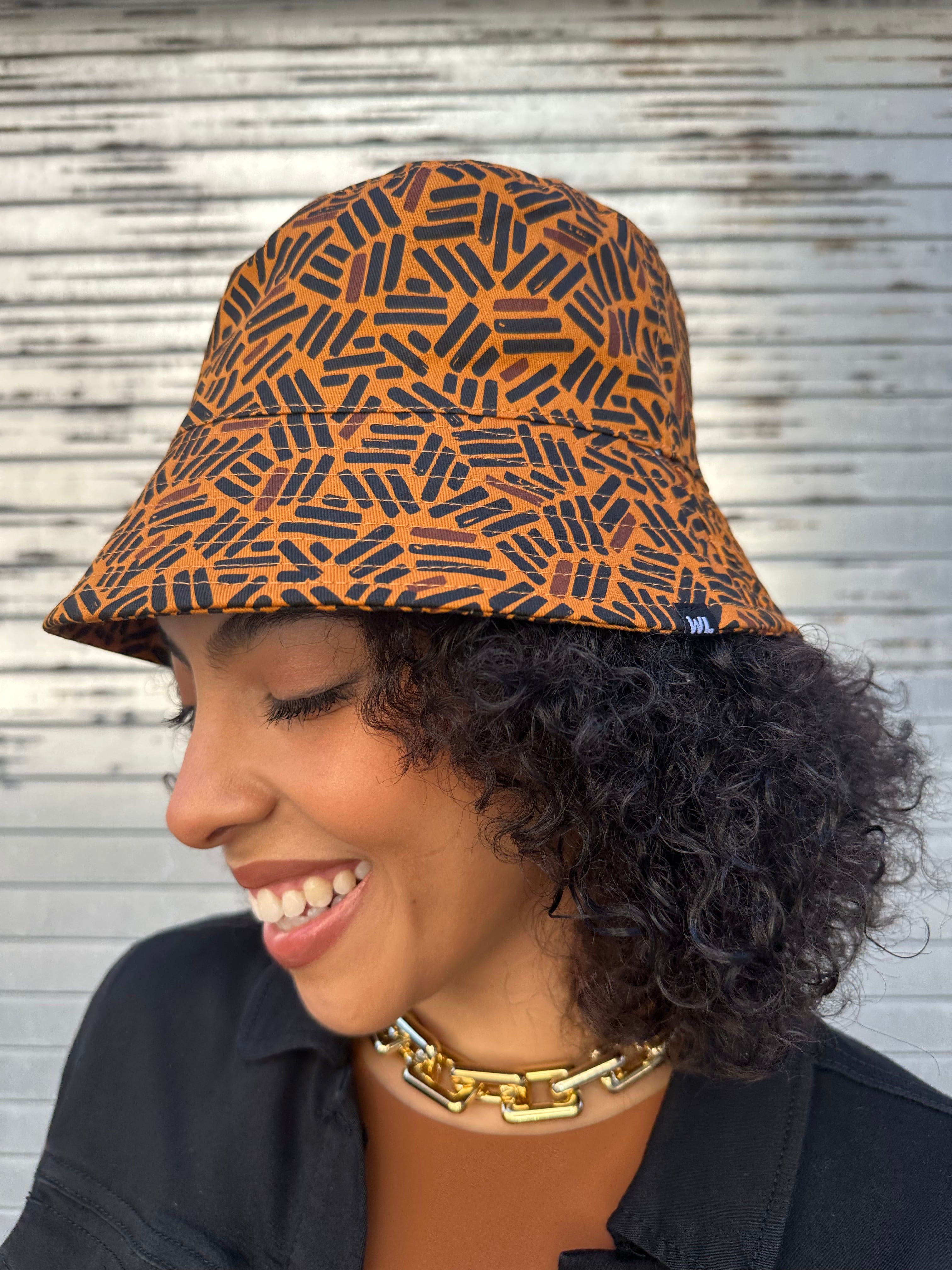 The Wrap Life Satin Lined Printed Bucket Hat in Umber Brown Hat