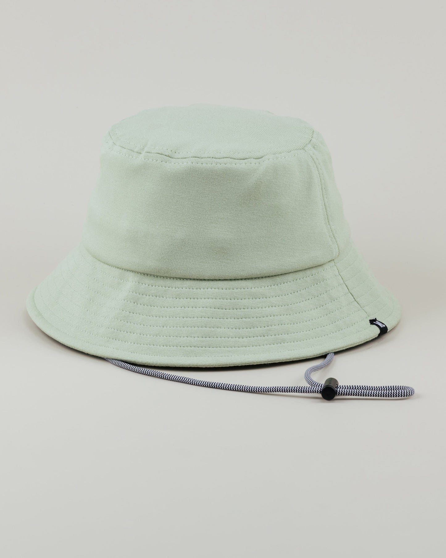The Wrap Life Solid Bucket Hat in Sage Green Hat